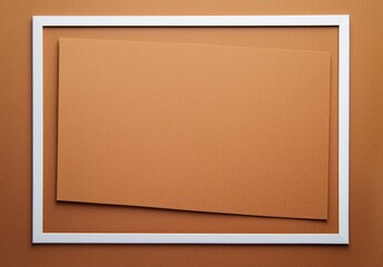 Poster - White frame displaying tilted orange paper on orange background emphasizing copy space for design, promoting simplicity and minimalism in visual communication