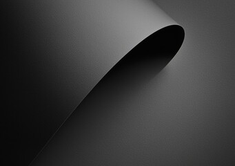 Poster - Gently curling black textured paper creates a captivating interplay of shadows and abstract shapes, enhancing the composition with depth and visual intrigue