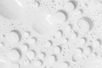 Poster - Creamy white foam creating an abstract pattern with bubbles of various sizes, providing a textured background ideal for beauty, skincare, or cleaning product concepts
