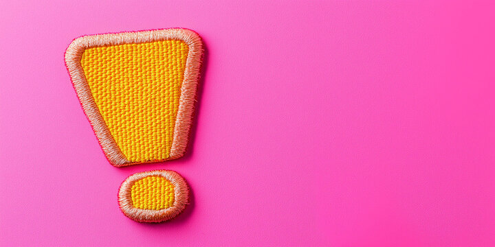 Yellow embroidered exclamation mark, pink background
