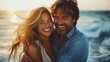 © O - Joyful caucasian man and woman laughing together by the ocean at sunset