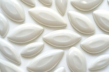 Poster - Glossy White Tiles Arranged in Unique Leaf Shapes on Background
