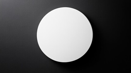 Leinwandbilder - A minimalist white circle on a plain black background, creating a bold and striking visual contrast.