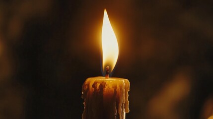 Aufkleber - Close-up of a candle flame flickering softly in the dark, casting a warm, golden glow and creating a serene, peaceful ambiance.