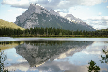 Wall Mural - Mount Rundle reflecting in Vermillion Lakes surrounded by forest