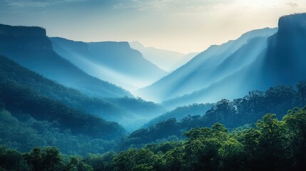 Wall Mural - Misty mountain vista with layered blue and green tones.