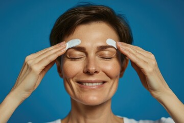 Poster - A person wearing eye patches, likely for medical or cosmetic reasons
