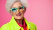 © Nataliia_Trushchenko - Woman in a yellow jacket and green and blue glasses is smiling. She is wearing a bright and colorful outfit