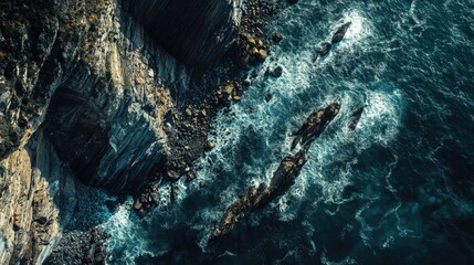 Wall Mural - A rocky shoreline with a large body of water in the background. The rocks are scattered throughout the scene, with some closer to the shore and others further out in the water