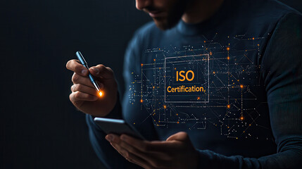 Poster - Man holding smartphone with digital ISO certification concept, showcasing technology and innovation in business. image reflects modern certification processes