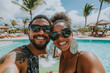 © MashMash - Smiling couple enjoying a sunny poolside vacation with stylish sunglasses and tropical drinks at a luxurious resort.