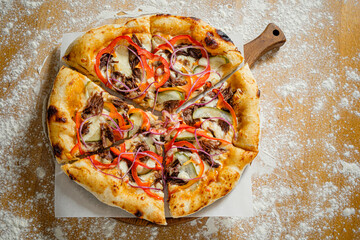 Wall Mural - tasty pizza on the flour background, top view