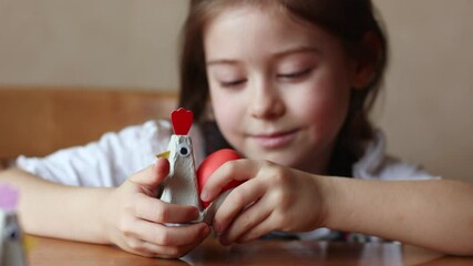 Wall Mural - kids craft - egg stand made from packaging carton. child playing with chicken for Easter