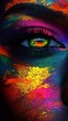 © KarpenArt Studio - A close-up of an eye with vibrant colors splattered across the face.