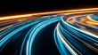 © Matthew - Abstract light trails in vibrant blue and orange colors create a dynamic motion effect at night