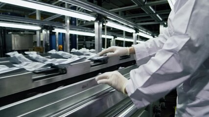 Poster - efficiency in a textile factory showcasing automated fabric handling and processing systems during d