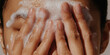 © Lila Patel - Close-up of Face and Hands with Cleansing Foam