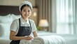 © Andrii - Stunning Asian Maid Crafting Beautiful Bed In Hotel Room With Space For Your Text. Ample Space For Customization Provided.