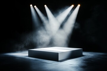 Poster - A clean design of a single spotlight shining down on a small podium, with all other areas left in shadow