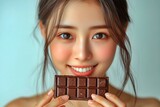 チョコレートを持つアジア人女性
