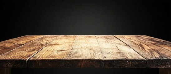 Poster - Rustic Wooden Table Surface Texture with Dark Background Ideal for Displaying Text or Products