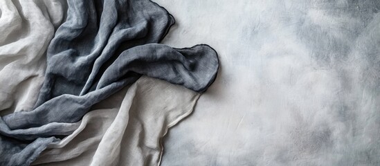 Poster - Natural Dyed Linen Fabrics in Shades of Grey with Soft Textures and Empty Copy Space for Sustainable Fashion Promotion