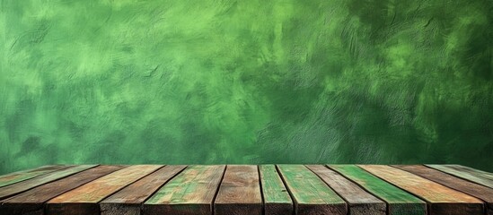 Poster - green wooden table with textured wood background and blank space for text or product display