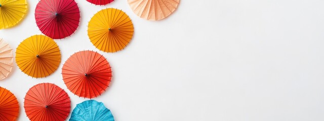 Aufkleber - Colorful Umbrellas on White Background Minimalist Design with Vibrant Hues and Ample Copy Space for Contemporary Compositions and Text