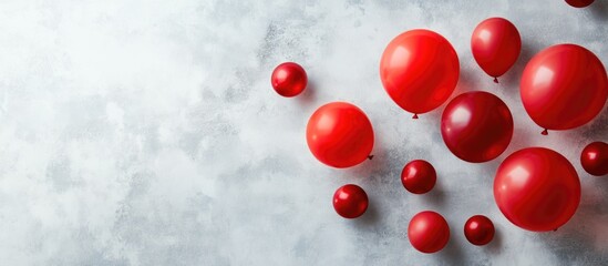 Poster - Red helium balloons in various shapes and sizes arranged on a light gray background with ample space for customizable text decorations