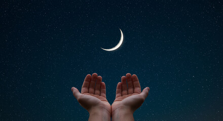 Poster - Hands reaching towards crescent moon in night sky. Two hands are open and facing up in the dark night with stars and moon