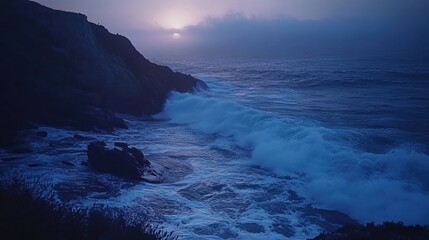 Aufkleber - Twilight coastal landscape showcasing gentle ocean waves and soft lighting reflections against rugged cliffs in a serene atmosphere