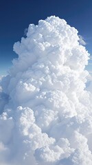 Wall Mural - single white cloud against a dark blue background , isolated clouds, landscape