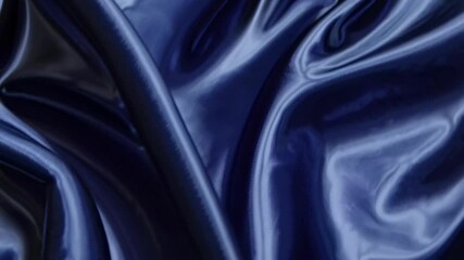 Poster - Ocean depths visualized. Swirling blue silk-like textures mimic deep sea currents. Abstract marine animation for relaxation and aquatic themes