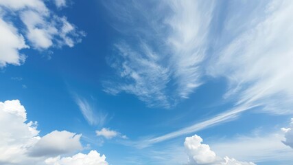 Wall Mural - painting of sky with vibrant clouds in shades of blue and white, celestial, dreamy, tranquil