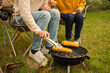 © tonefotografia - Enjoying a Sunny Afternoon as Friends Gather for a Barbecue in a Backyard Setting