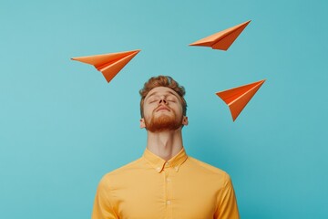 Poster - Vibrant Office Relaxation Young Slim Caucasian Male with Paper Airplanes in Colorful Break Room Modern Stress Relief and Workplace Well-being for Enhanced Productivity
