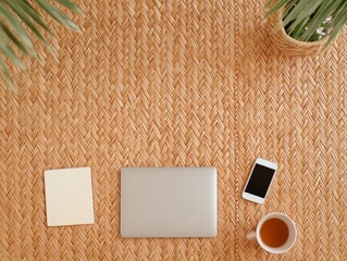 Poster - Woven Warmth Flatlay Senior-Friendly Tech Essentials for Online Business - Minimalist Laptop, Smartphone, Notepad and Tea on Eco Mat for Digital Inclusivity