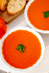 Wall Mural - Famous vegetables soup from Cordoba, Andalusia salmorejo served cold in restaurant for lunch as starter dish close up