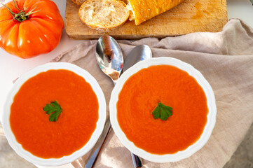 Wall Mural - Famous vegetables soup from Cordoba, Andalusia salmorejo served cold in restaurant for lunch as starter dish close up