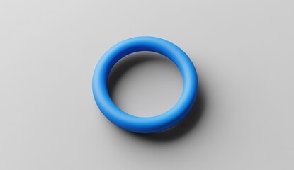 Blue ring-shaped object on a gray background.