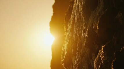 Poster - Golden Sunset Light Illuminates Rugged Rock Face