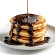 © Print Stock - Delicious pancakes topped with rich chocolate sauce, inviting breakfast scene on a clean white backdrop, perfect for culinary inspiration