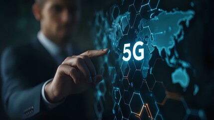 Poster - Businessman pointing at glowing 5G network symbol on digital world map with hexagonal pattern background, representing global connectivity and wireless technology.