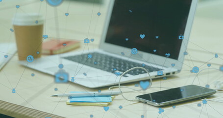 Poster - Image of network of connections with icons over empty office with laptop