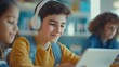 © A Denny Syahputra - Smiling Student Boy Using Tablet in Classroom