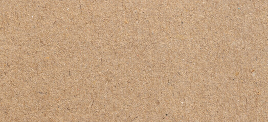 Wall Mural - brown paper eco recycled, kraft paper sheet texture cardboard for background.