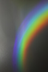 Poster - rainbow reflective colorful sunlight on textured surface of wall. dispersion and refraction of light