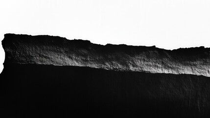 Poster - Abstract black and white landscape showcasing a dramatic cliff edge with stark contrasts