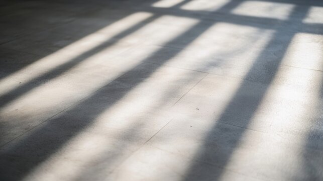 Gleaming sharp light scattered across a neutral surface, creating a luminous background for graphic text.