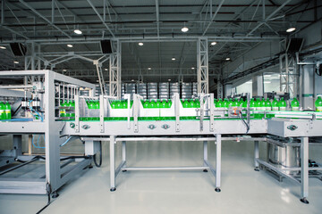 Poster - bottling process at a beverage manufacturing facility during daytime operations
